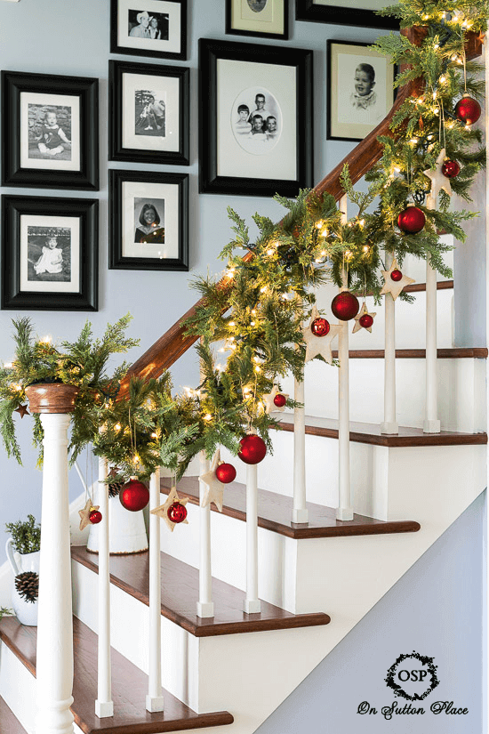Holiday lights garland staircase banister