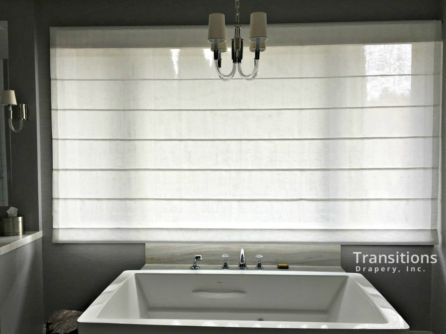 Roman shades over bathtub