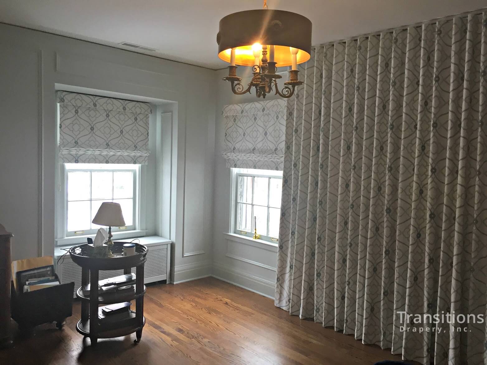 custom made drapes and matching roman shades for large wall